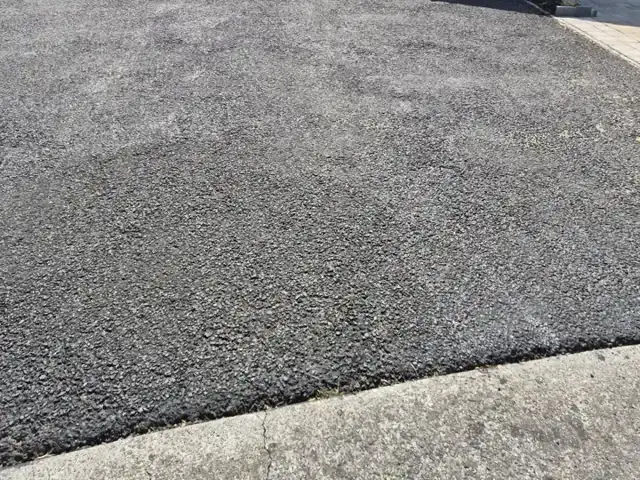 Finished chip driveway in front of a bungalow
